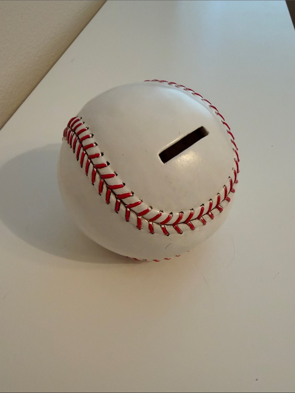 Hobby Lobby White Baseball Coin Bank with Red Stitching